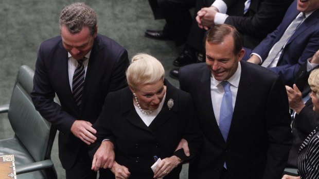 Bronwyn Bishop is dragged to the Speaker's chair by Prime Minister Tony Abbott and Christopher Pyne after the 2013 election. 