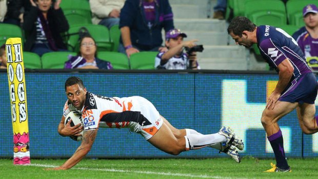 Touchdown: Benji Marshall was starting to find his running game - and the try line - against Melbourne before suffering toe-ligament damage.