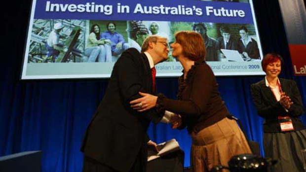 Kevin Rudd and Julia Gillard embrace at the 2009 ALP National Conference.