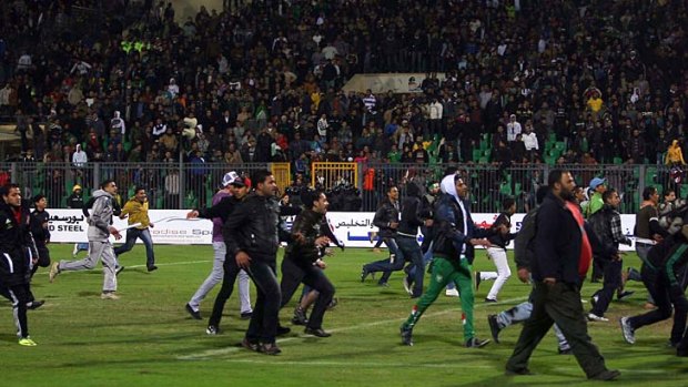 Pitch invasion ... fans ran on the field after the final whistle.