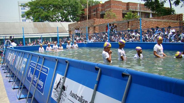 Portable pools provide a safe learning environment for children in Dhaka, Bangladesh.