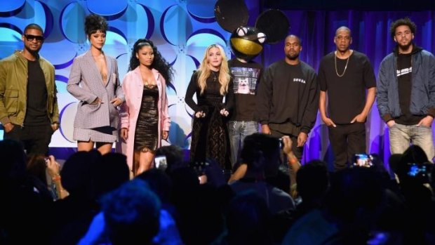 The big name artists committed to Tidal: (including, from left) Usher, Rihanna, Nicki Minaj, Madonna, Deadmau5, Kanye West, Jay Z and J. Cole.