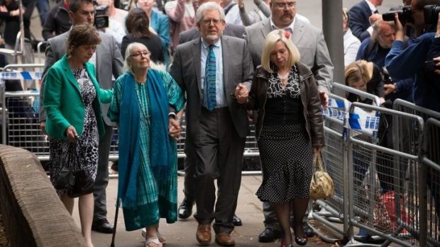 Rolf Harris leaves court after being found guilty of 12 indecent assault charges.