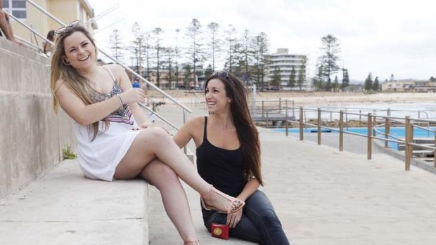 School's out: Lauren Carlton (left) and Carina Anderson are heading for the Gold Coast.