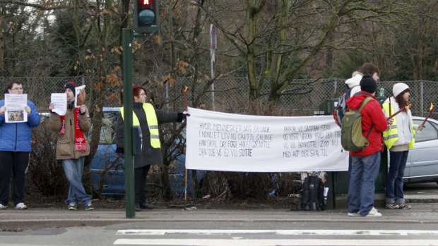 People protest outside Copenhagen Zoo.