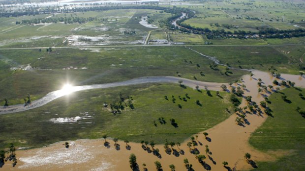 Disaster area declared ...floodwaters surrounding Coonamble as seen from the air.