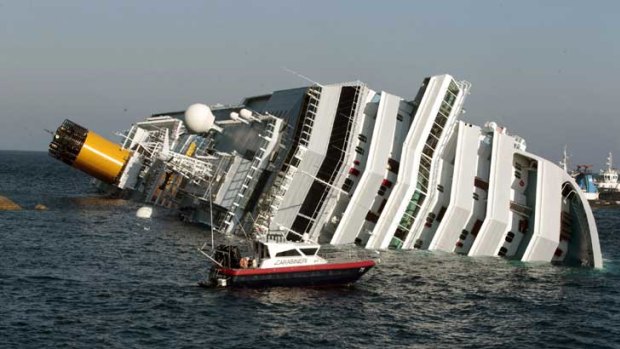 The capsized Costa Concordia after it ran aground on a trip around the Mediterranean.