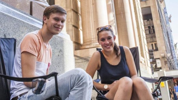 German backpackers Moritz Gadow and Kimberley Lewerentz waiting outside the Brisbane Apple Store for the new Iphone that goes on sale on Friday.