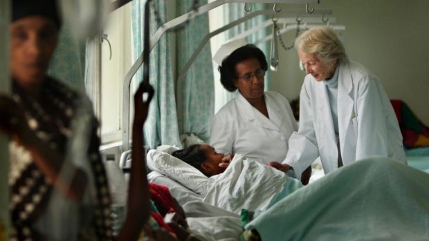 Dr Catherine Halmin and Sister Alem Tsehai treat a patient at the hospital in Ethiopia.