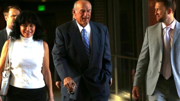 Former Minnesota Governor Jesse Ventura, centre, arrives at court with his wife, Terry, and others for the defamation case.