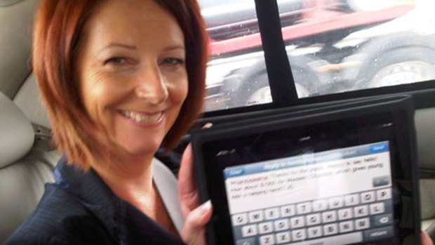 Prime Minister Julia Gillard shows off her iPad last year.