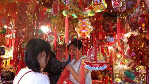 People shop in Chinatown ahead of Chinese New Year.