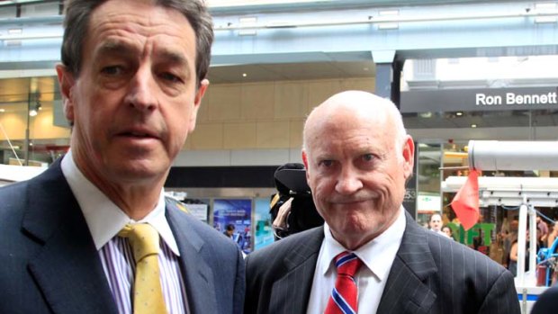 ''People would queue to talk to me'' ... Ian Macdonald, right, with his lawyer outside the hearing.