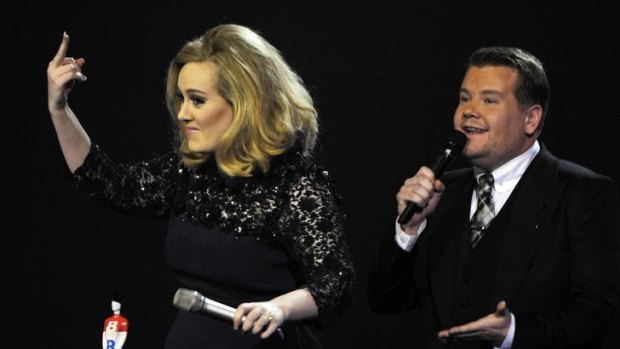 Best of British: Adele reacts to having her Brit Award speech cut off.