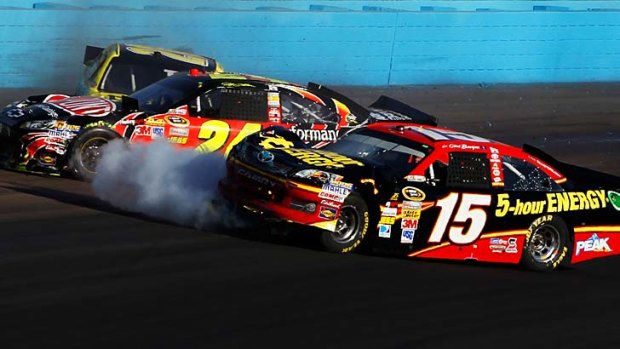 Clint Bowyer (right) and Jeff Gordon collide on the track during the NASCAR Sprint Cup Series AdvoCare 500 at Phoenix International Raceway.
