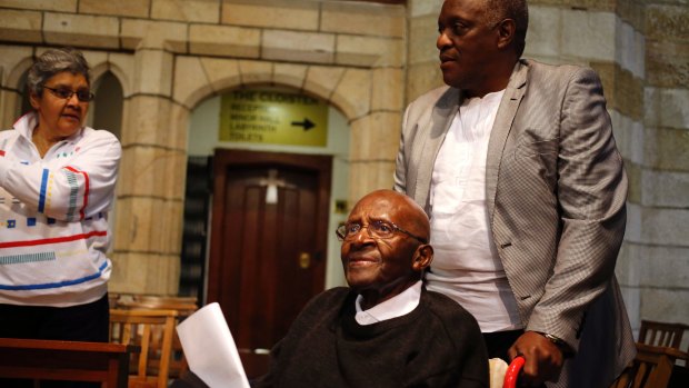 Archbishop Desmond Tutu arrives at the St George's Cathedral in Cape Town to celebrate his 85th birthday on Friday.