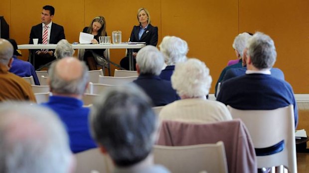 Liberal leader Zed Seselja, Greens leader Meredith Hunter and ACT Chief Minister Katy Gallagher at the Hughes Community Centre where they announced their policies for the elderly.