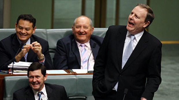 Goodbye to all this ...  Peter Costello makes a valedictory address in Parliament yesterday after announcing his retirement at the next election.