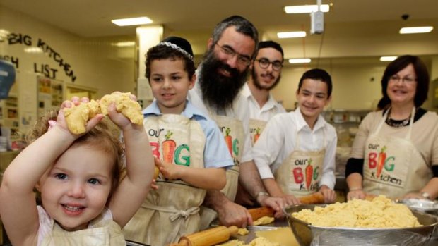 Made with love ... Rabbi Dovid Slavin with wife Laya and children Sara, Shlomie, Zevi and Mendel.