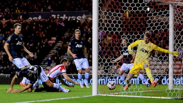Own goal: Ryan Giggs of Manchester United scores at the wrong end to give Sunderland the lead in the League Cup semi-final first leg at the Stadium of Light.