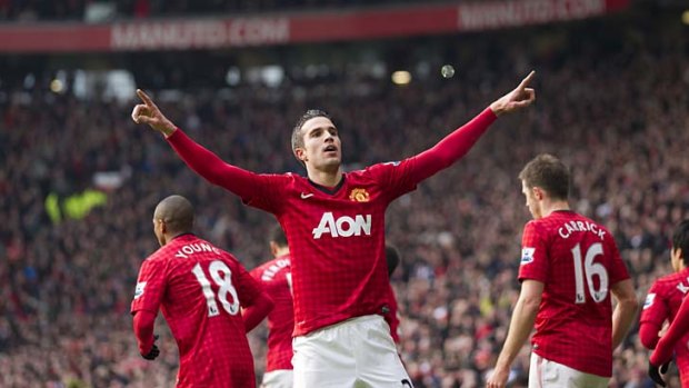 Red hot: Manchester United's Robin van Persie celebrates after scoring against Liverpool.