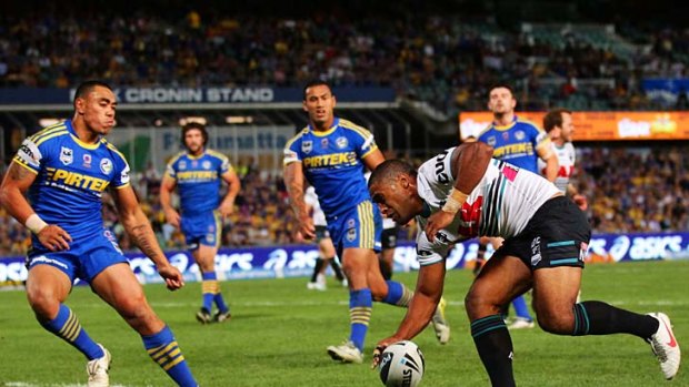 Michael Jennings of the Panthers scores against the Eels.