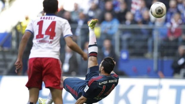 Claudio Pizarro of Bayern Munich scores his side's fourth goal. 