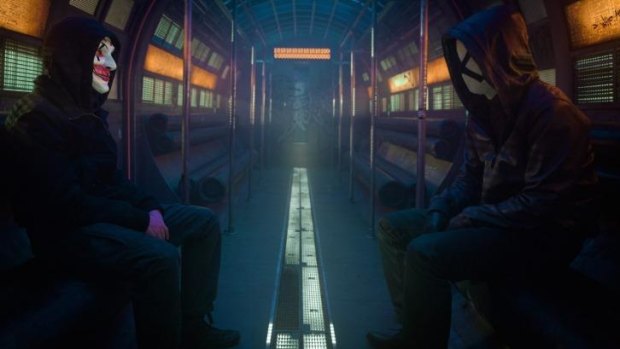 Masked characters ride the metro in <i>Who Am I – No System is Safe</i>.