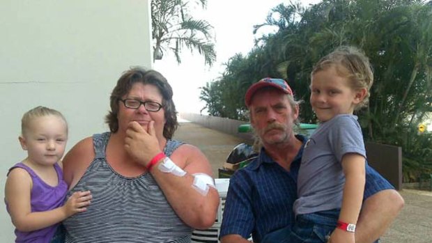 Belle and Andrew Stevens fled their Acacia Ridge home with grandchildren Hayley and Sean in the middle of the night as the waters rose and the power was cut.