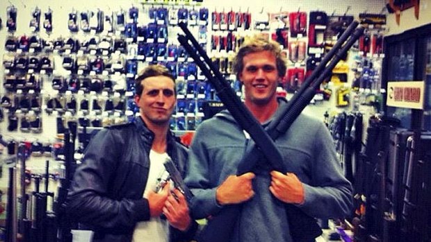 Outraged? You're kidding, right? PICTURE COURTESY OF CHANNEL SEVEN.     Australian swimmer Nick D'Arcy has been ordered to get rid of this controversial photo - of him and teammate Kenrick Monk - posing with guns. The picture has been up on D'Arcy's Facebook page - officials want it removed. Swimming Australia says the image is inappropriate - and has breached social media guidelines.