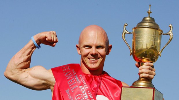 Nathan Allen holds his Stawell Gift trophy last year.