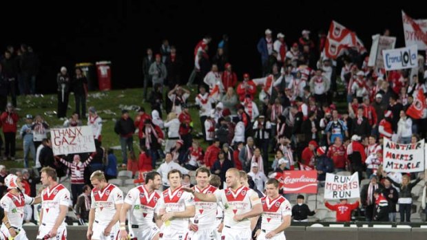 Team to beat ... the Jubilee Oval faithful salute the Dragons after their last game of the year at Kogarah. Wayne Bennett has his team perfectly poised for back-to-back titles.
