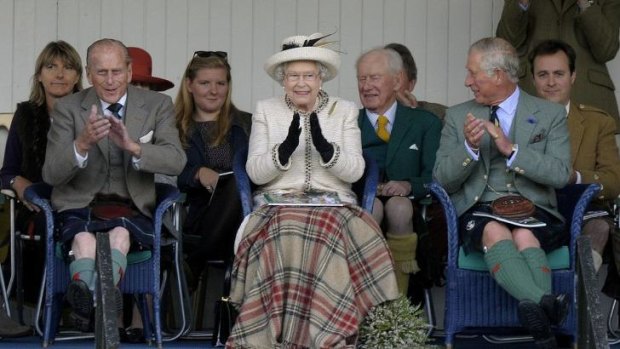 The Queen, Prince Phillip and Prince Charles attend the Braemar Gathering in Braemar, central Scotland, on Saturday.