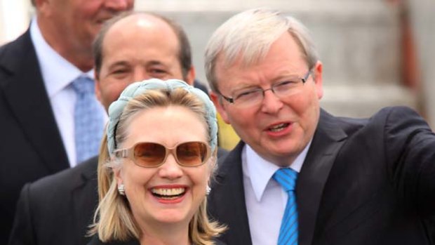 Prime gaffe... US Secretary of State Hillary Clinton is greeted by Foreign Affairs Minister Kevin Rudd before mistakenly referring to him as "prime minister". Mr Rudd made no attempt to correct her.