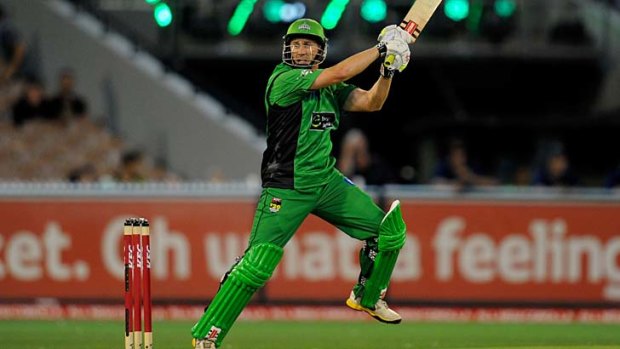 Hard slog: David Hussey hits out for the Melbourne Stars at the MCG on Saturday night in the Big Bash League win over the Hobart Hurricanes.