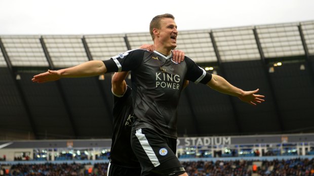 Leicester's Robert Huth celebrates scoring his team's third goal against Manchester United.