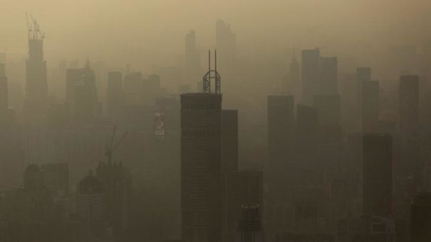 Smog hangs in the air around buildings in the Luohu district of Shenzhen.