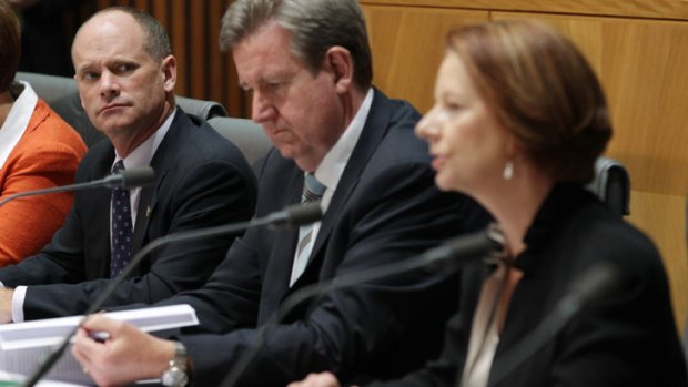 Queensland Premier Campbell Newman, NSW Premier Barry O'Farrell and Prime Minister Julia Gillard face media at the Council of Australian Governments meeting.