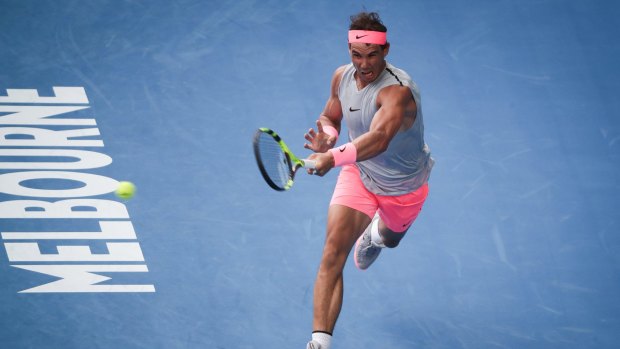 Toughing it out: Rafael Nadal in action against Diego Schwartzman at Rod Laver Arena.