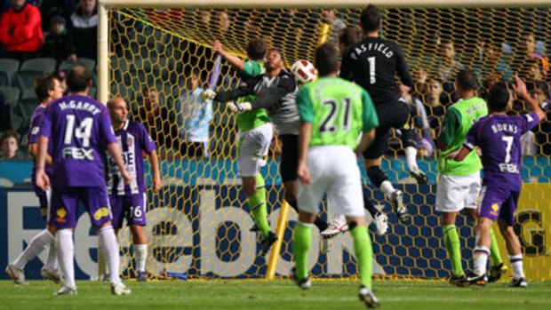 Glory goalkeeper Tando Velaphi fails to save a shot on goal by Fury's Chris Grossman in stoppage time at nib Stadium on Friday night.