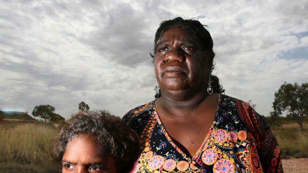 Yapa Yapa traditional owner Dianne Stokes, with daughter Sky, wants answers from government over plans to build a waste dump near Tennant Creek, Northern Territory.