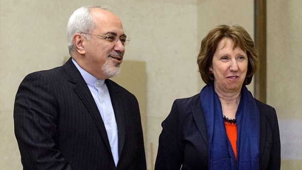 Iranian Foreign Minister Mohammad Javad Zarif and EU foreign policy chief Catherine Ashton arrive for closed-door nuclear talks in Geneva on November 20.