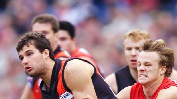 Peter Berbakov playing as a defender in his days with Essendon.