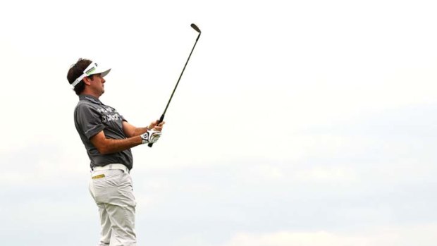 Eyes up: American Bubba Watson keeps track of his ball at the Australian Open.