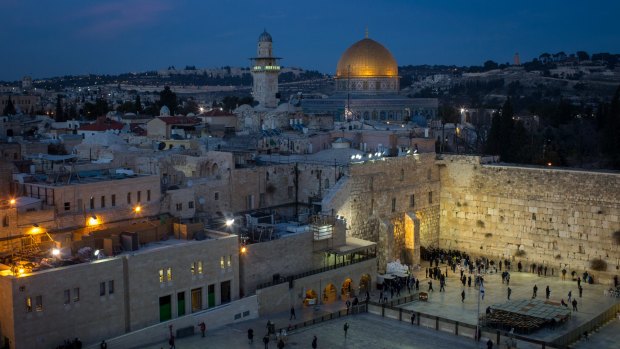 The Western Wall in Jerusalem's Old City (right) and the Dome of the Rock above.