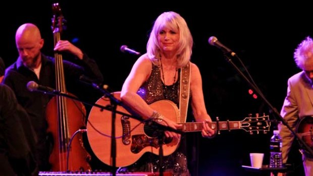 From mournful to fragile to airy to resolute with ease ... Emmylou Harris performing with the Red Dirt Boys.