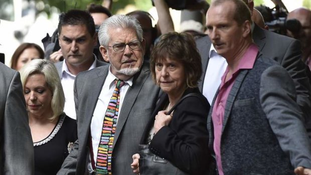 Rolf Harris arrives for sentencing with his daughter Bindi (left) and niece Jenny.