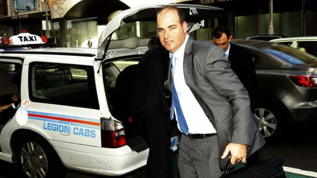 Mediation: Former Australian cricket coach Mickey Arthur arrives with his legal team at the office in William Street, Sydney where he is seeking damages after his sacking.