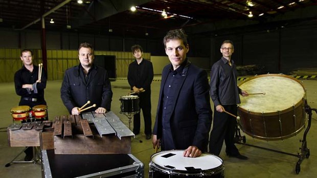Band of brothers: Members of Synergy Percussion (from left) Mark Robinson, Joshua Hill, William Jackson, Timothy Constable and Ian Cleworth brace themselves for a challenging new program.