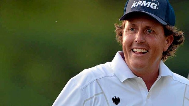 Phil Mickelson clings to the lead after topsy-turvy day at the US Open.